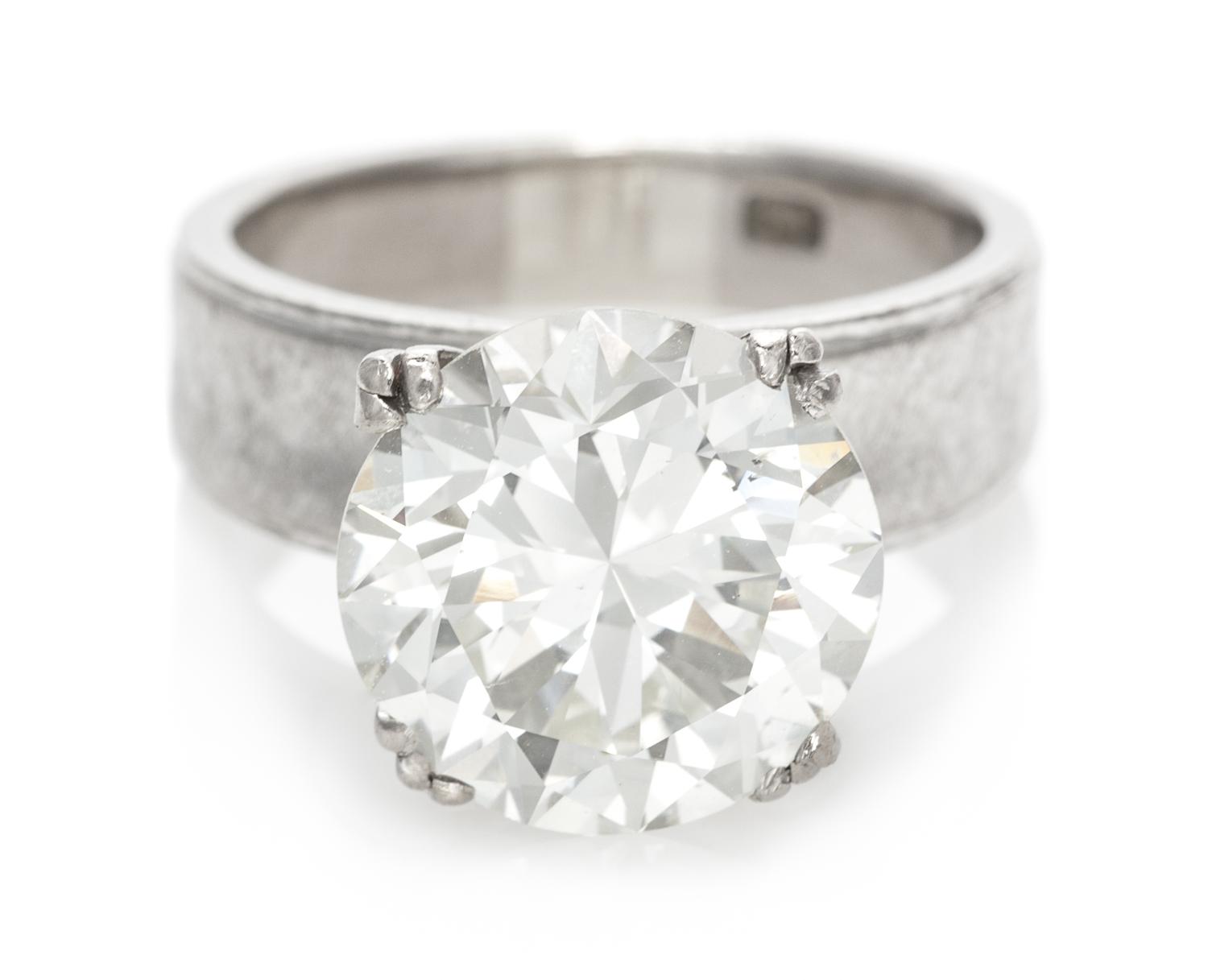 A 7.14 Carat Round Brilliant Cut Diamond,