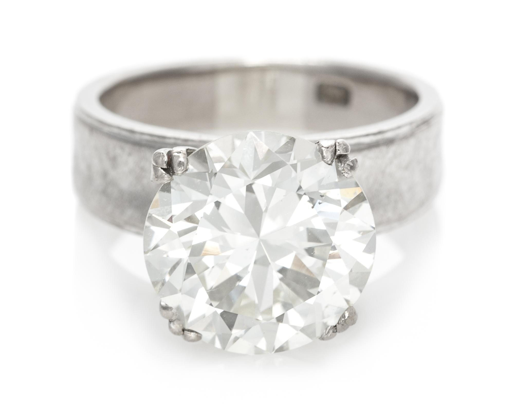 A 7.14 Carat Round Brilliant Cut Diamond,