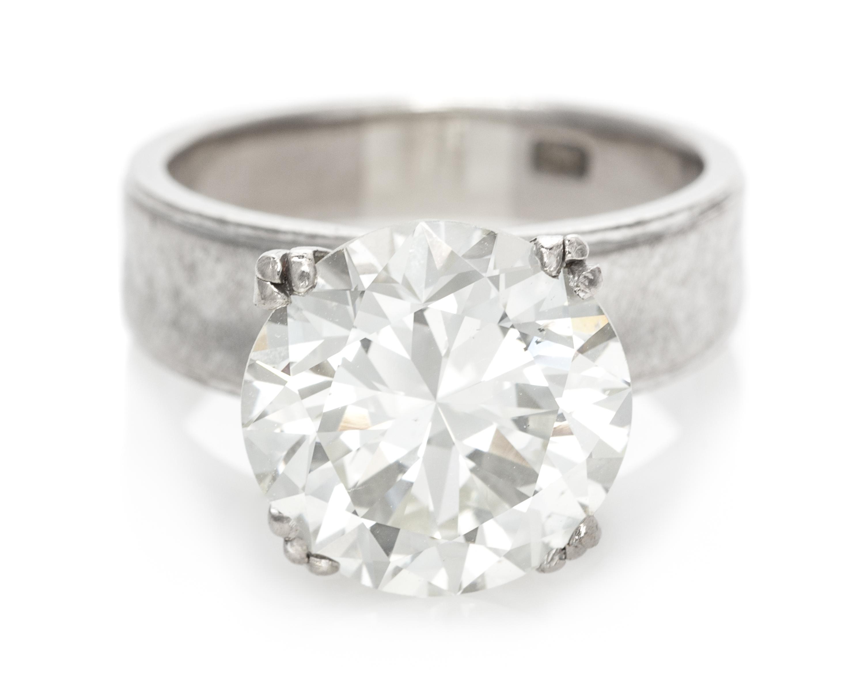 A 7.14 Carat Round Brilliant Cut Diamond,