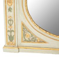 A North Italian Painted and Parcel Gilt Mirror