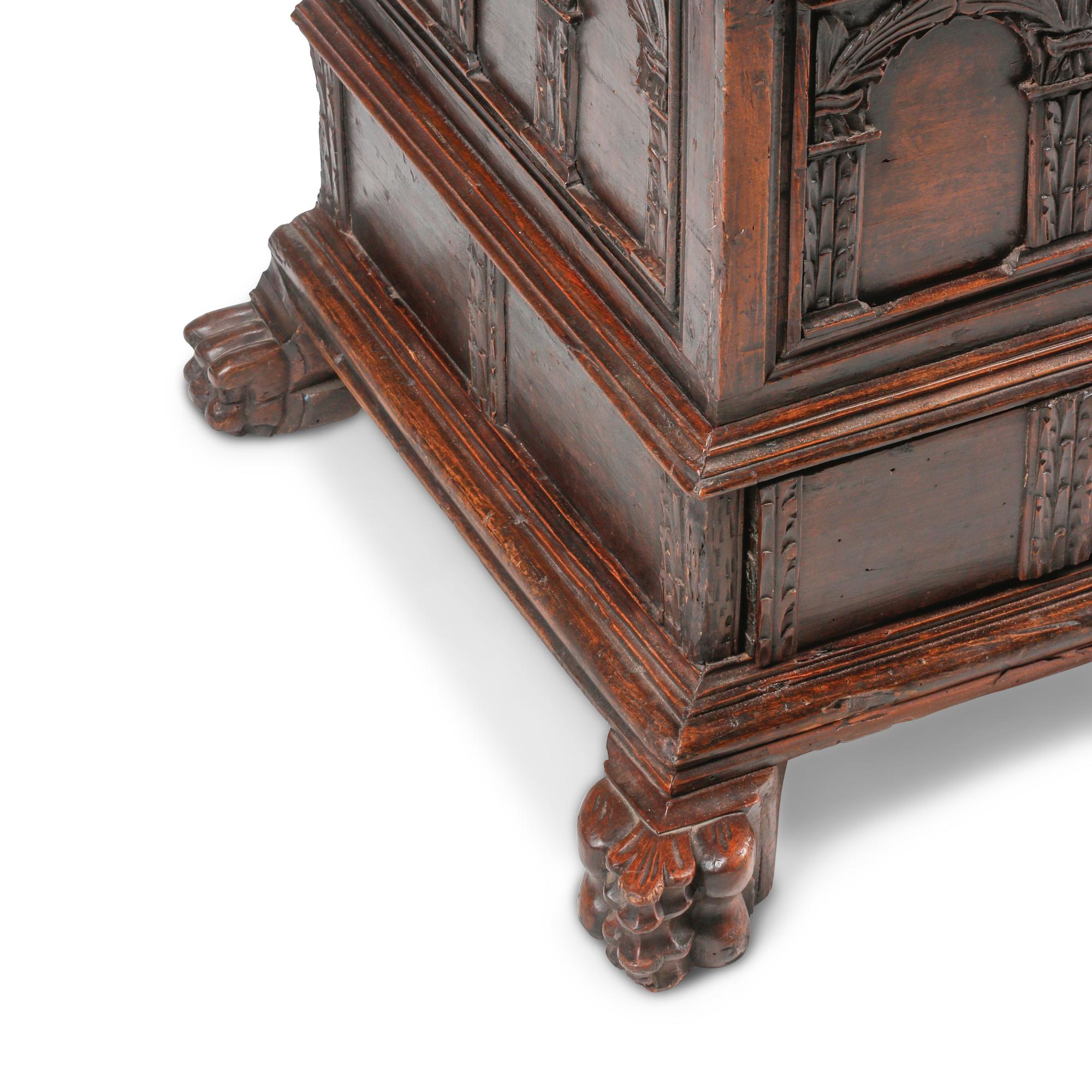 A Continental Carved Walnut Cassone