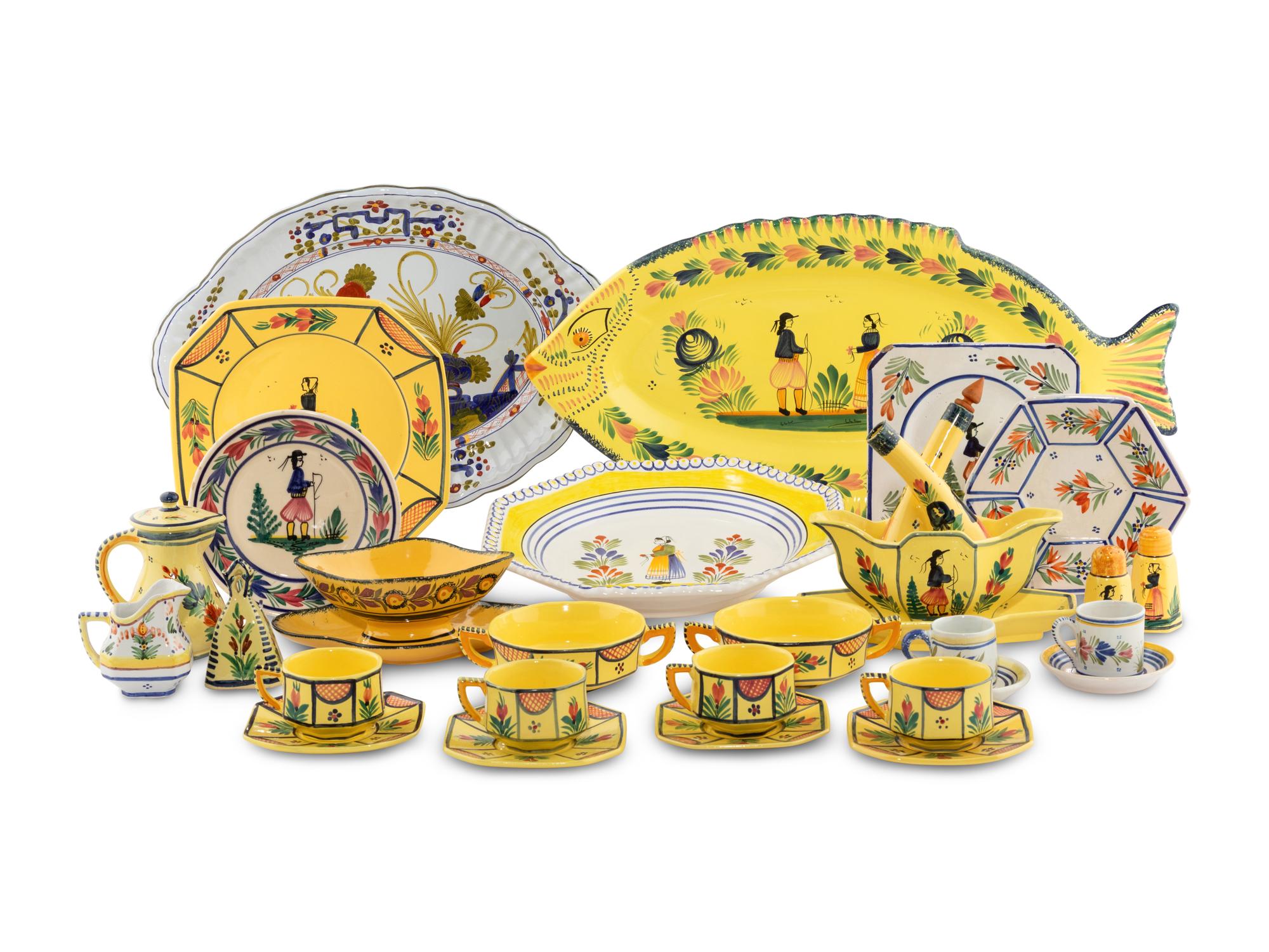 An Assembled Set of French Quimper Dinnerware