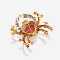 A coral, diamond, and bicolor gold pendant/brooch