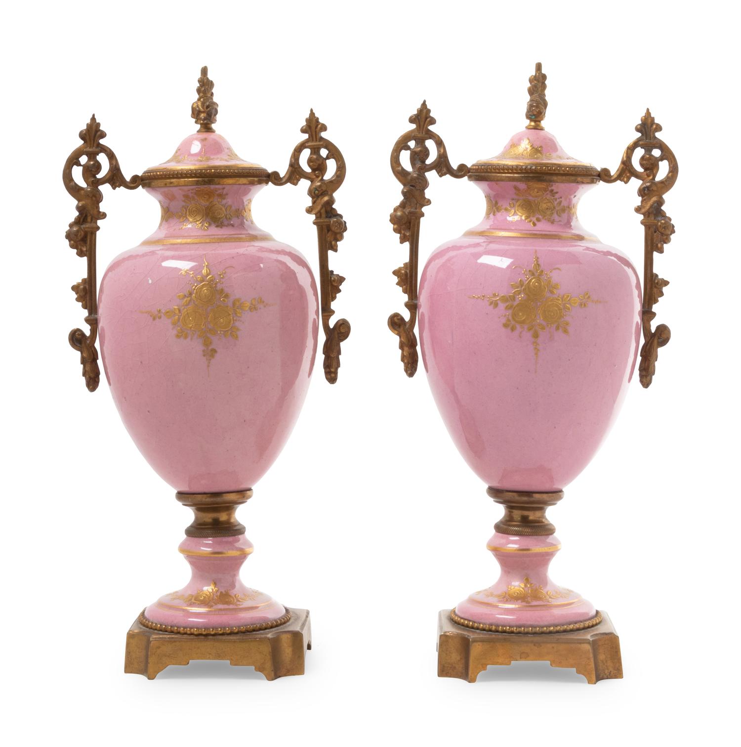 A Pair of Gilt Bronze Mounted Sèvres Style Porcelain Covered Urns