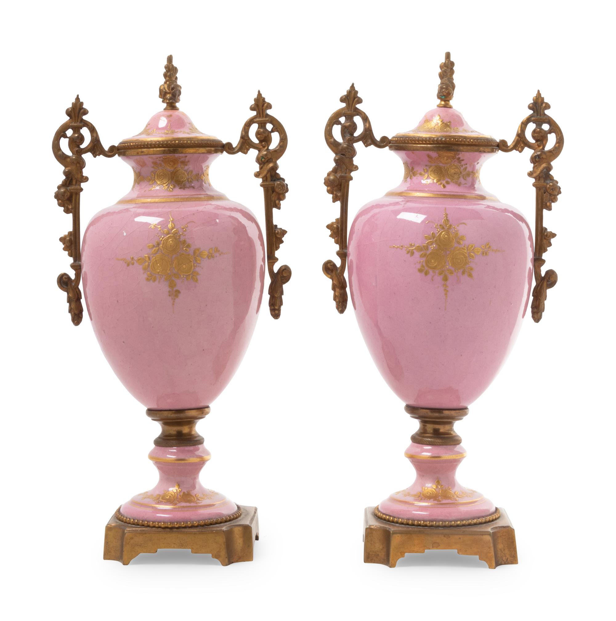 A Pair of Gilt Bronze Mounted Sèvres Style Porcelain Covered Urns