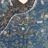 A Chinese Dark Blue Ground Kesi Silk Dragon Robe, 19th Century — 清晚期 石青地緙絲龍紋袍