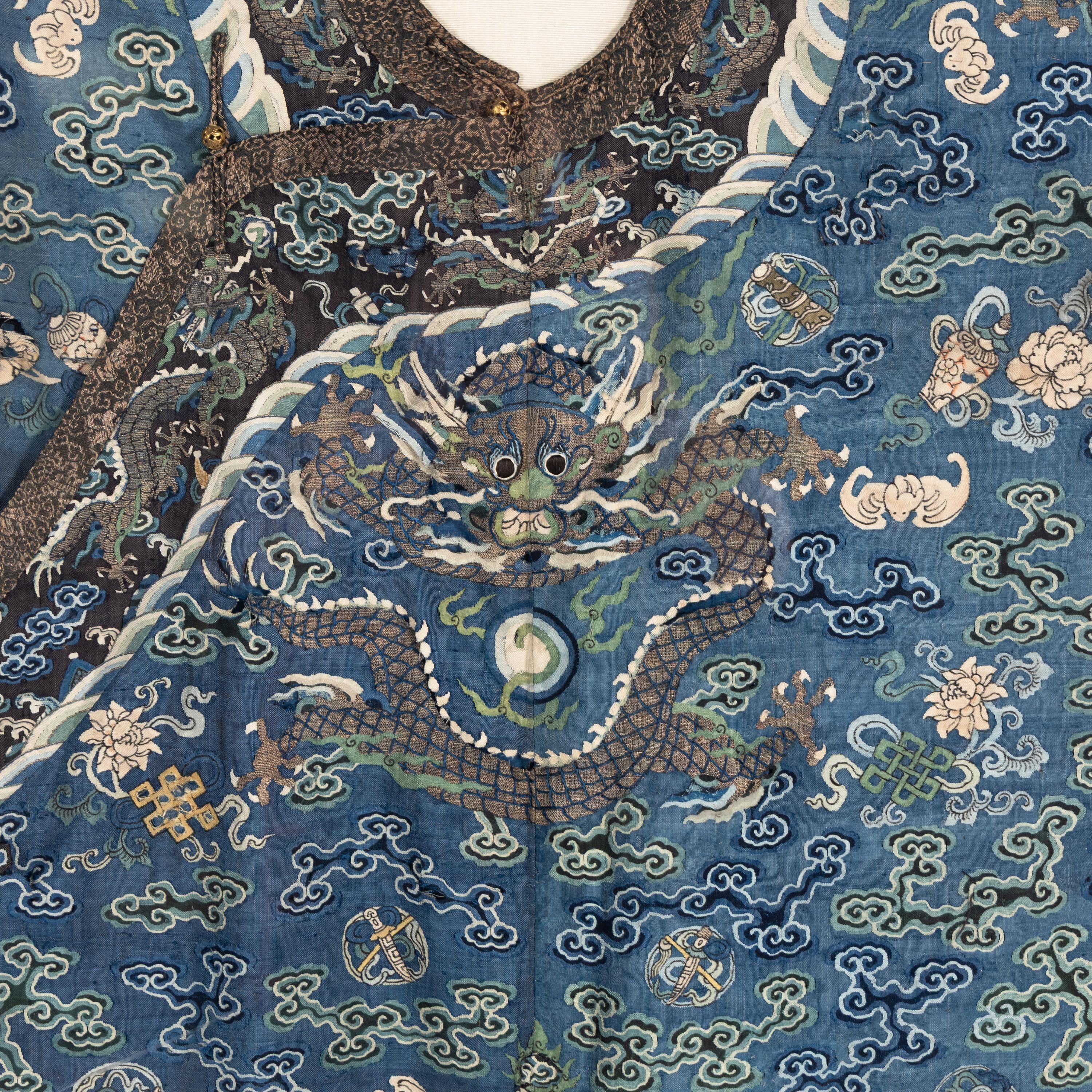 A Chinese Dark Blue Ground Kesi Silk Dragon Robe, 19th Century — 清晚期 石青地緙絲龍紋袍