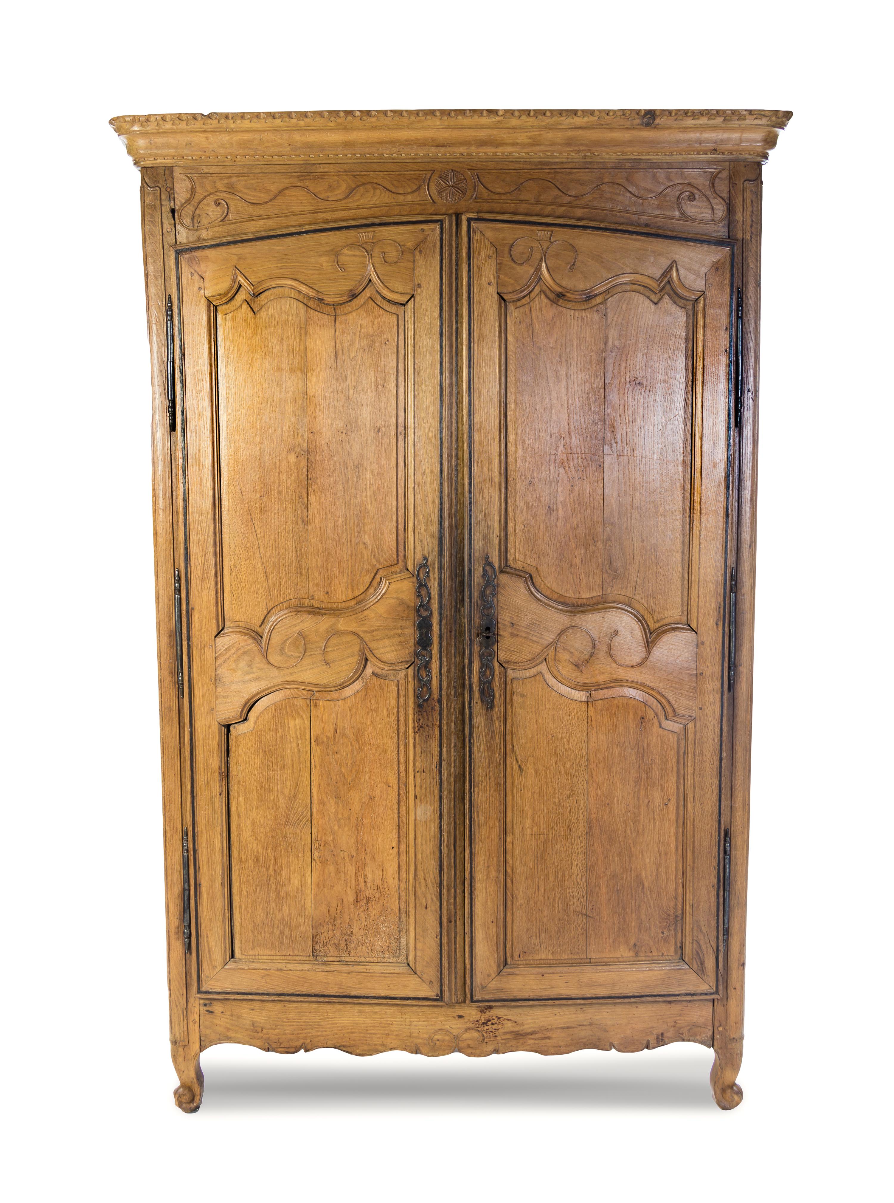 A French Provincial Oak Armoire, Height 93 x width 56 x depth 24 1/2 inches.