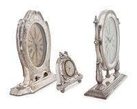 A Collection of Three Silver Desk Clocks