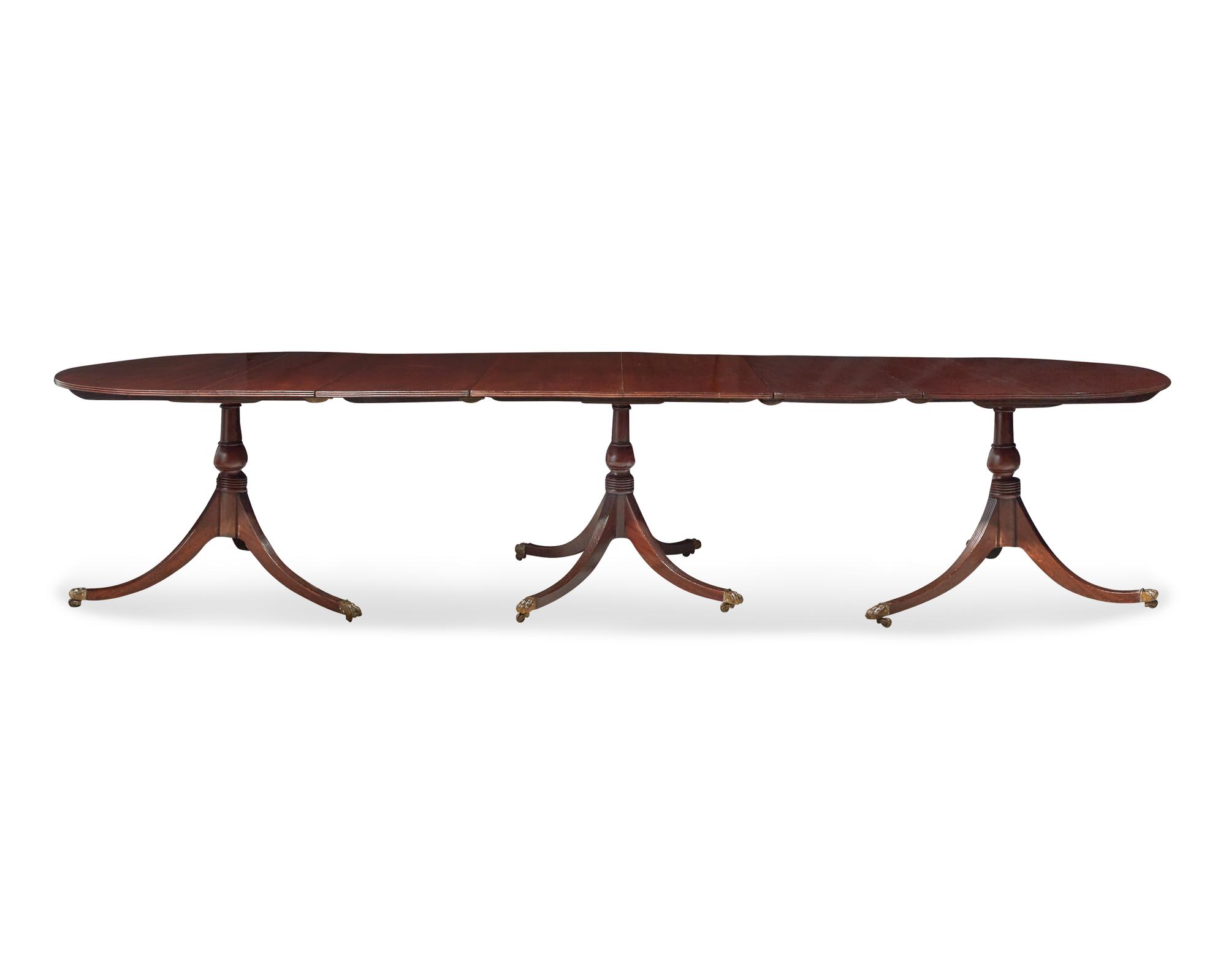 A George III three-part mahogany dining table, circa 1800