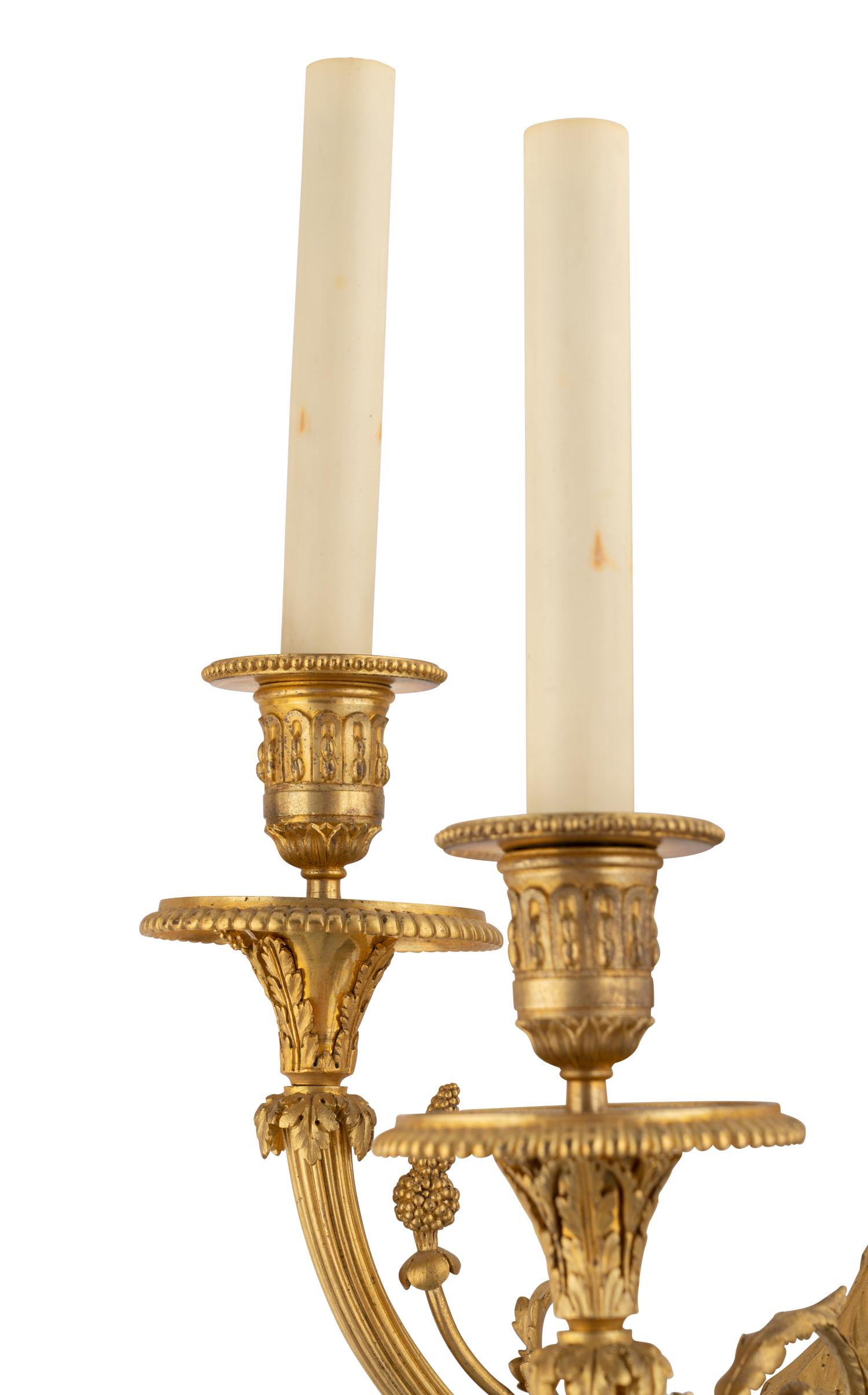 A Pair of Louis XVI Style Gilt Bronze Five-Light Wall Lights