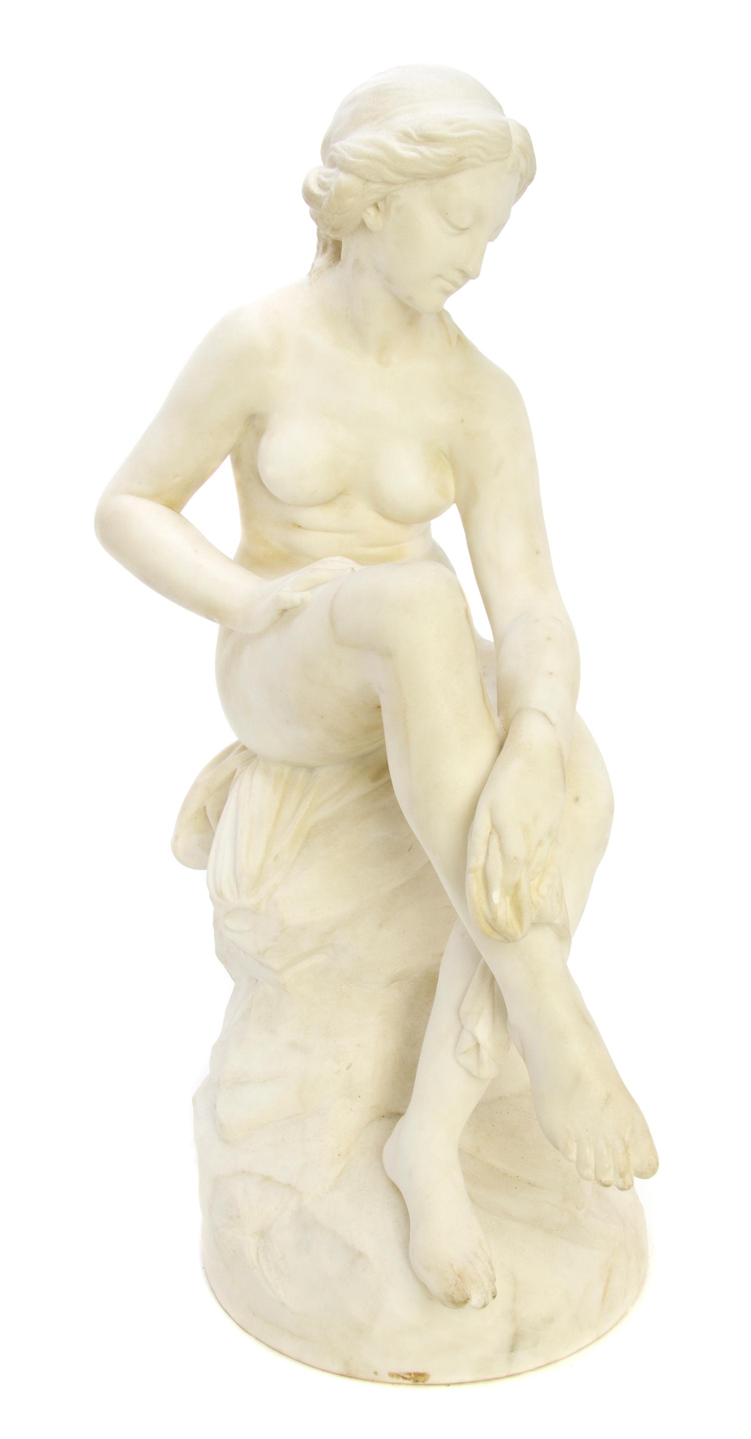 A Continental Carved Marble Animalier Figure, Width 25 inches.