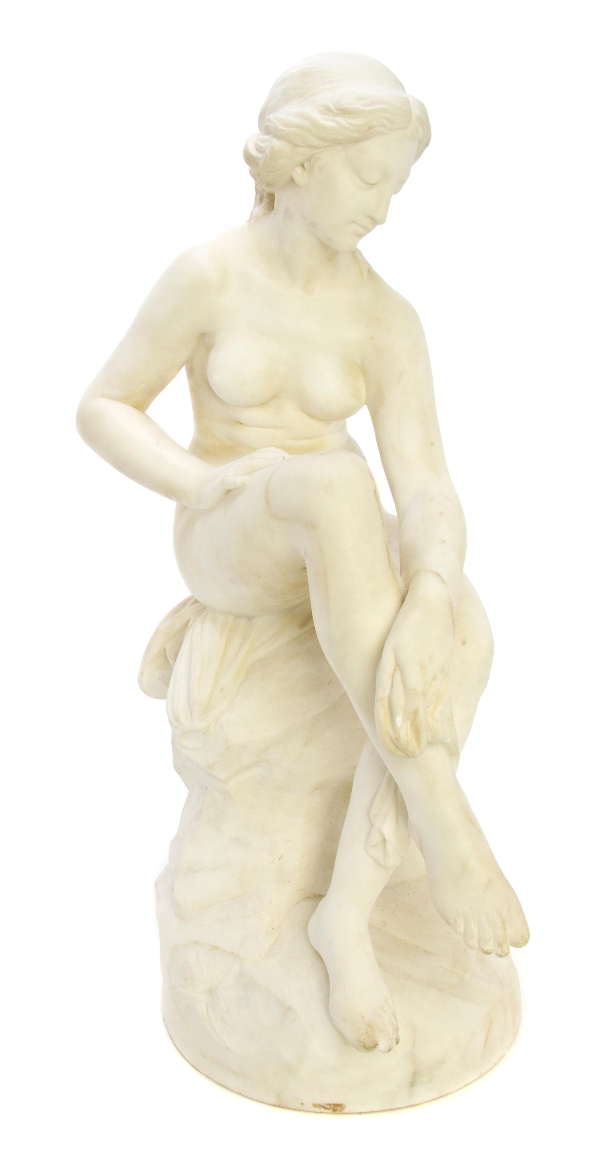 A Continental Carved Marble Animalier Figure, Width 25 inches.