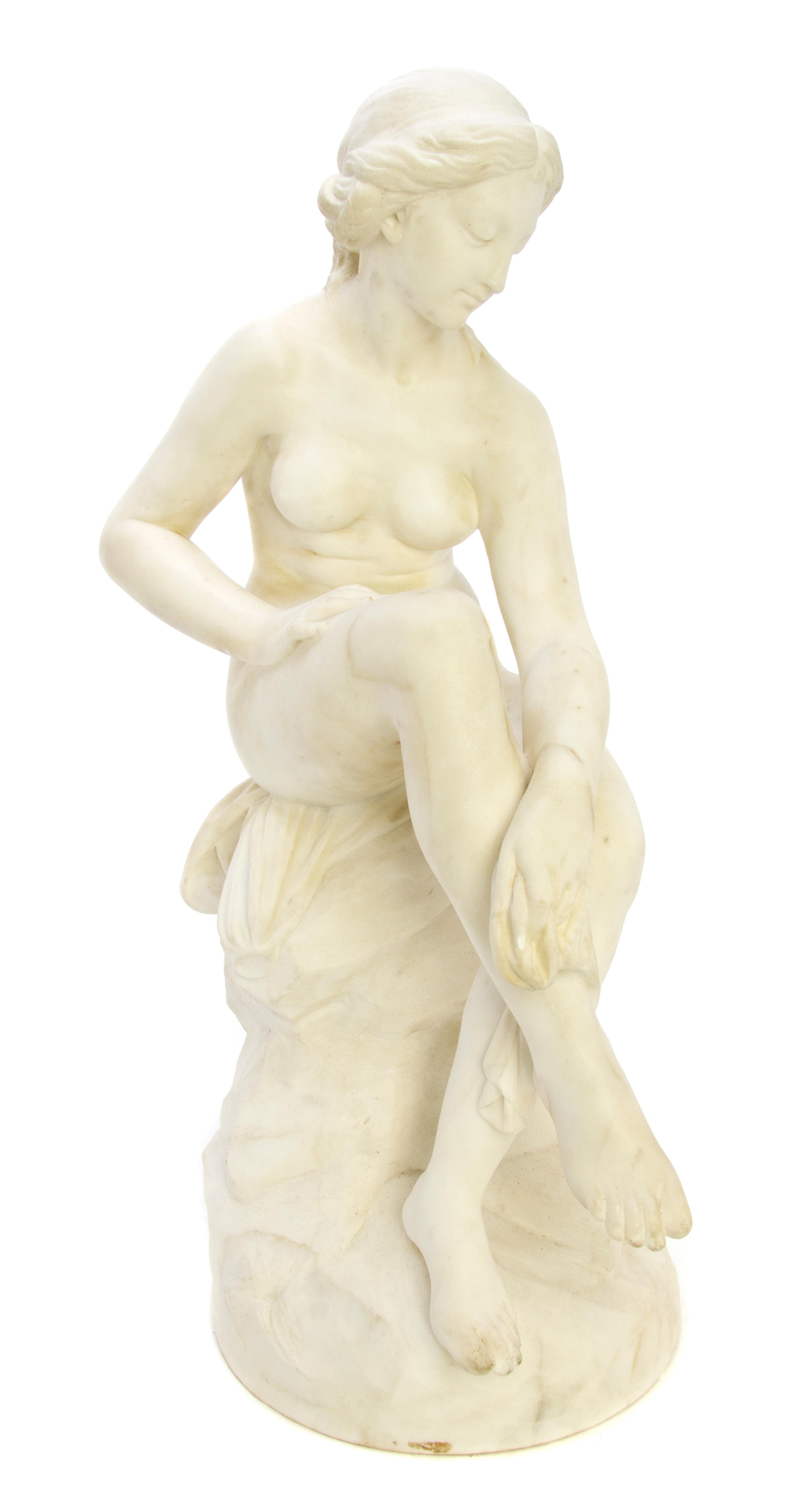 A Continental Carved Marble Animalier Figure, Width 25 inches.