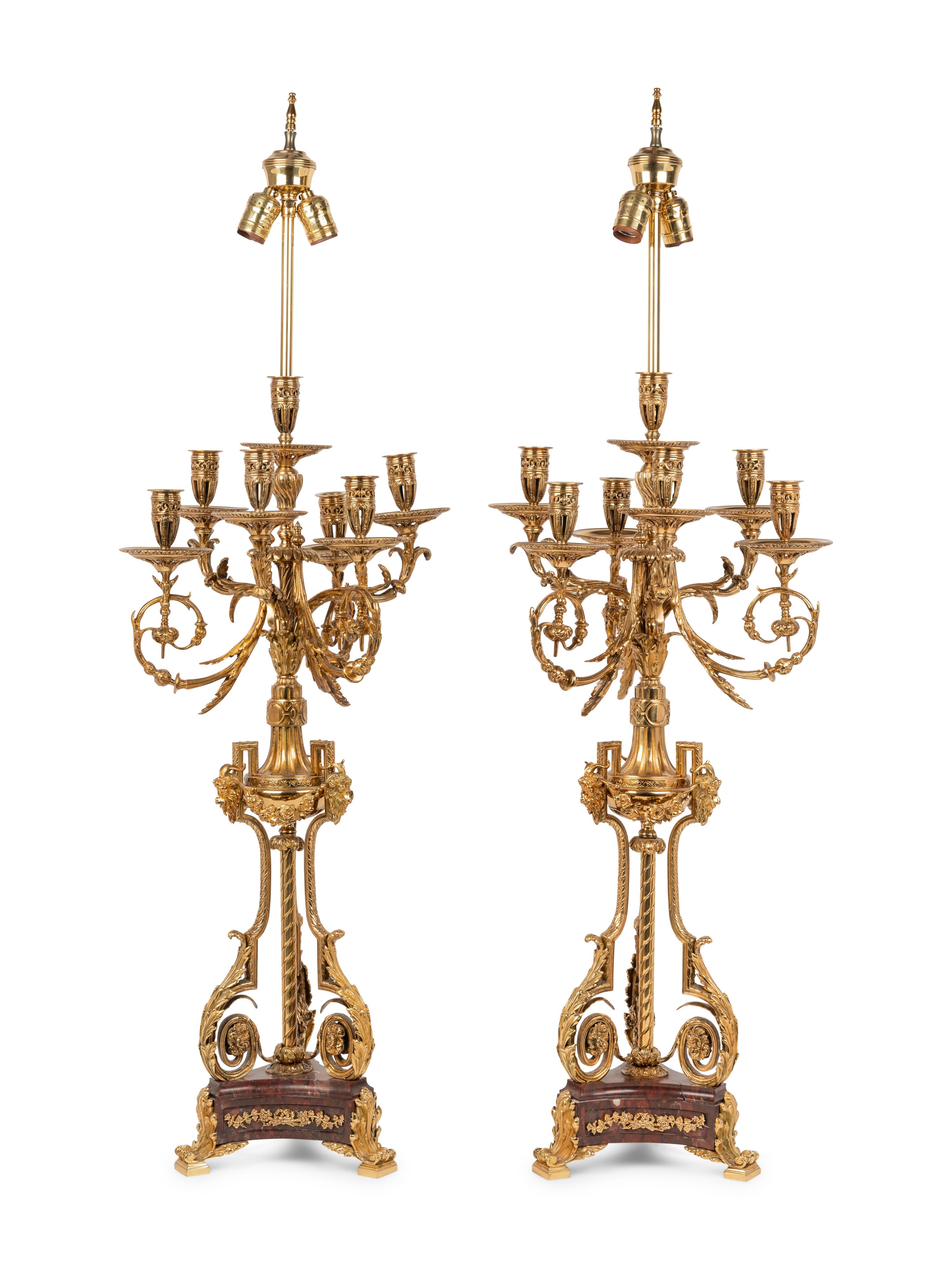 A Pair of Louis XVI Style Gilt Metal and Marble Seven-Light Candelabra Mounted as Lamps