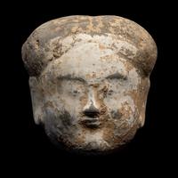 A Chinese Pottery Head of an Attendant
