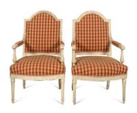 A Pair of Louis XVI Style Cream-Painted Fauteuils