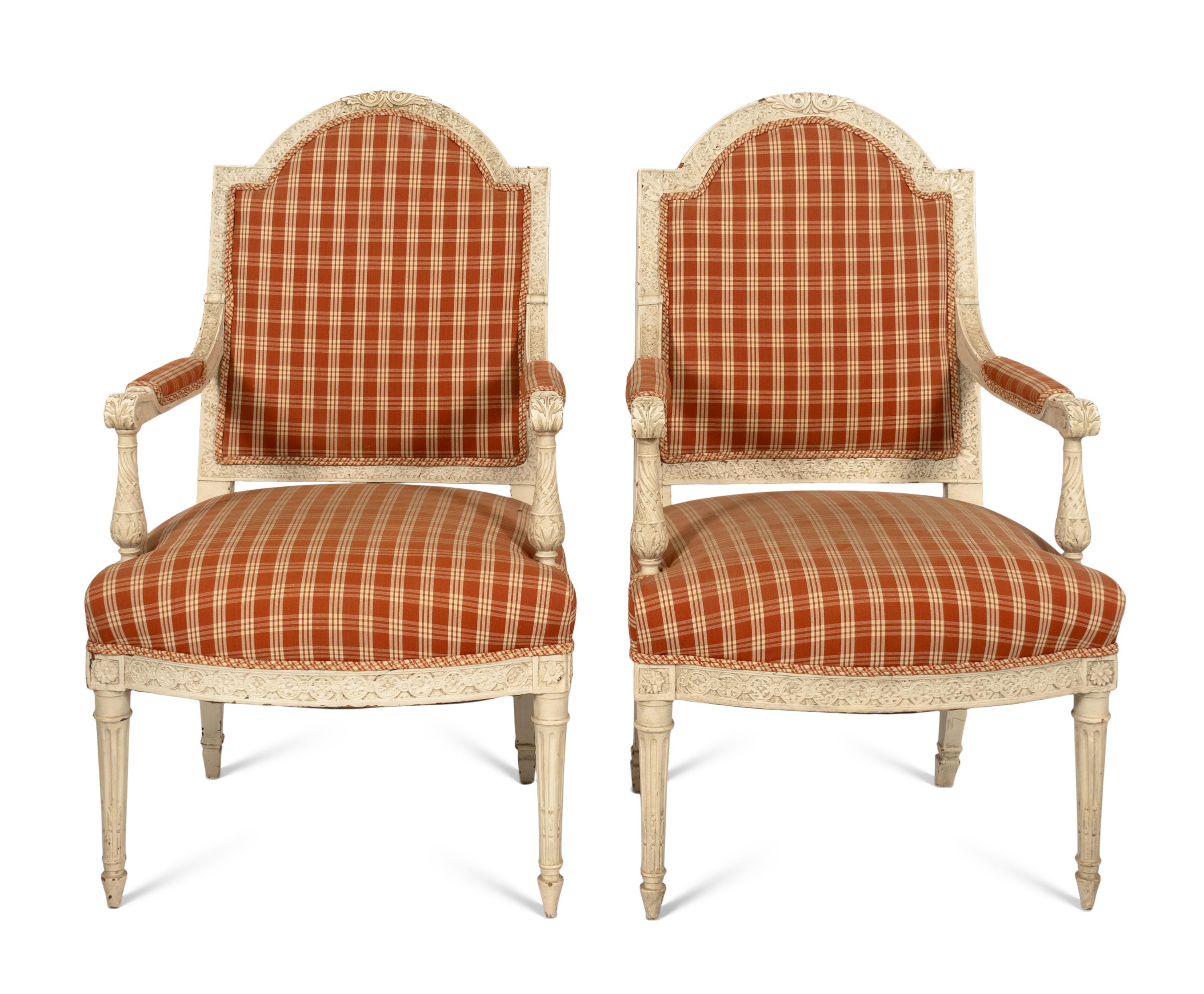 A Pair of Louis XVI Style Cream-Painted Fauteuils