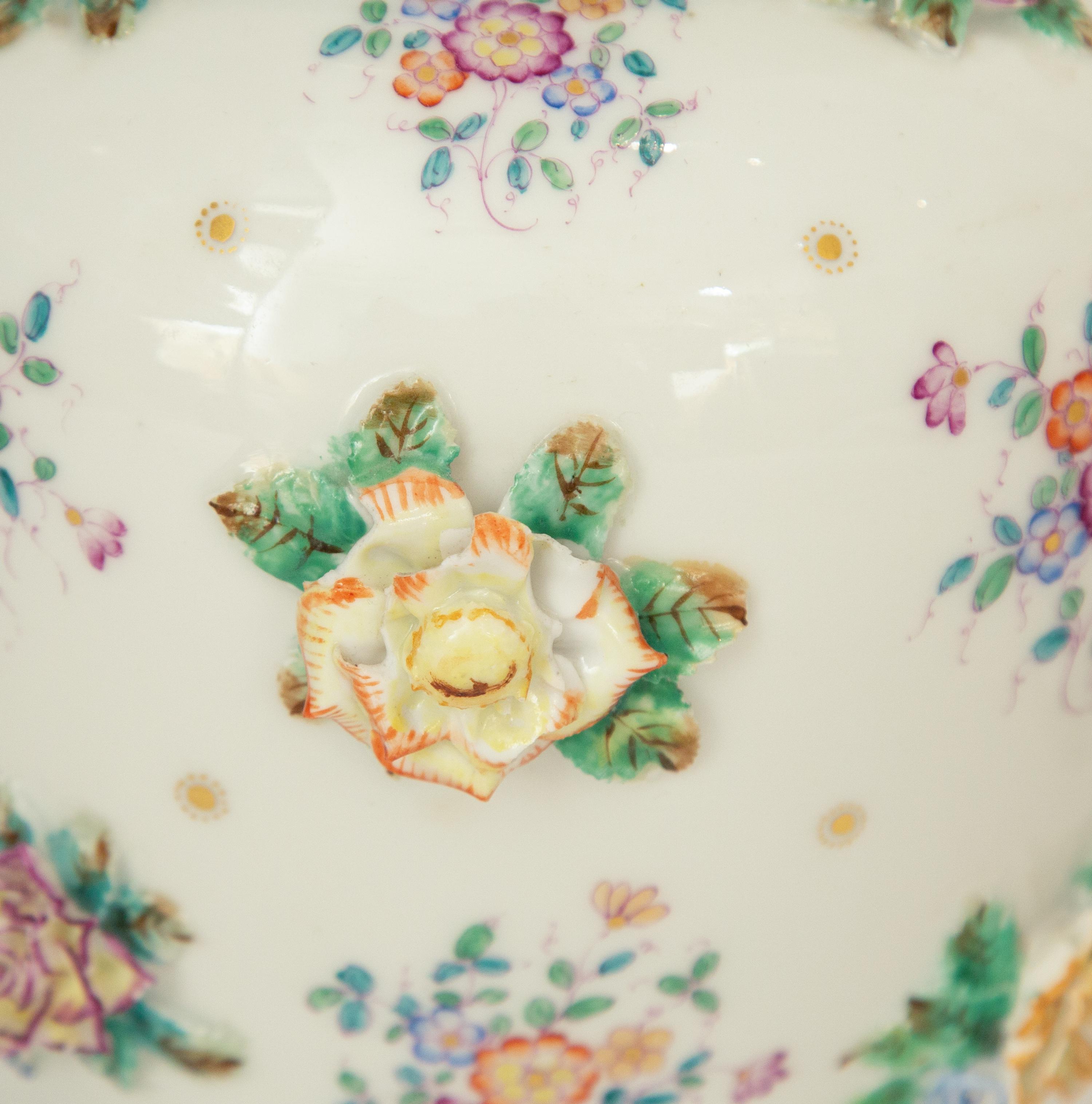 A Pair of Meissen Porcelain Covered Jars with Figural Finials