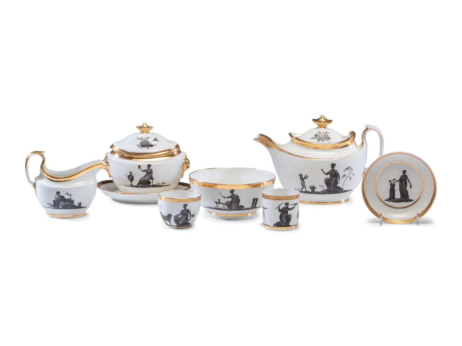 An English Porcelain Bat-Printed and Parcel Gilt Porcelain Tea Service