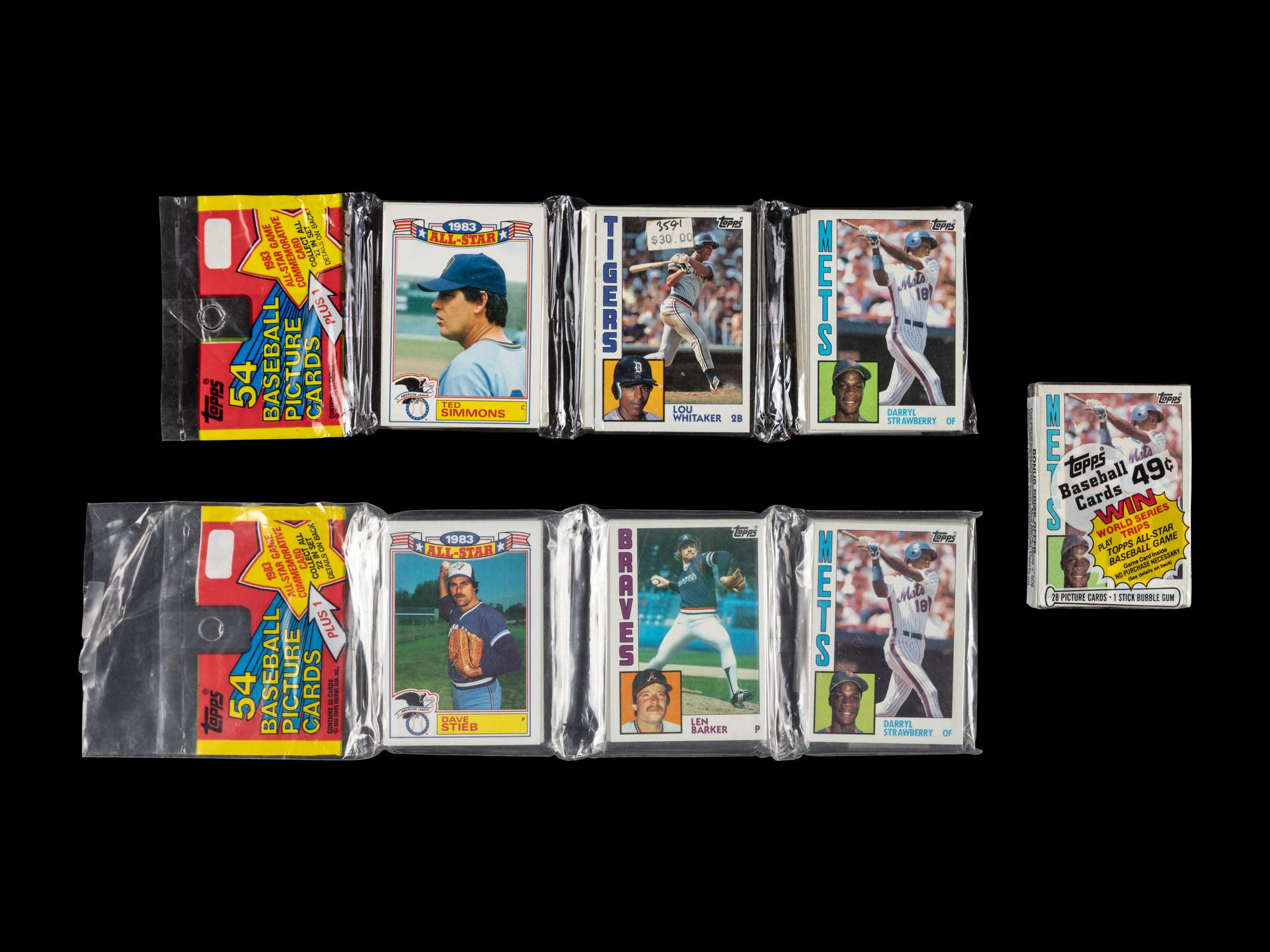 A Collection of 1984 Topps Baseball Card Packs with Darryl Strawberry Card Visible
