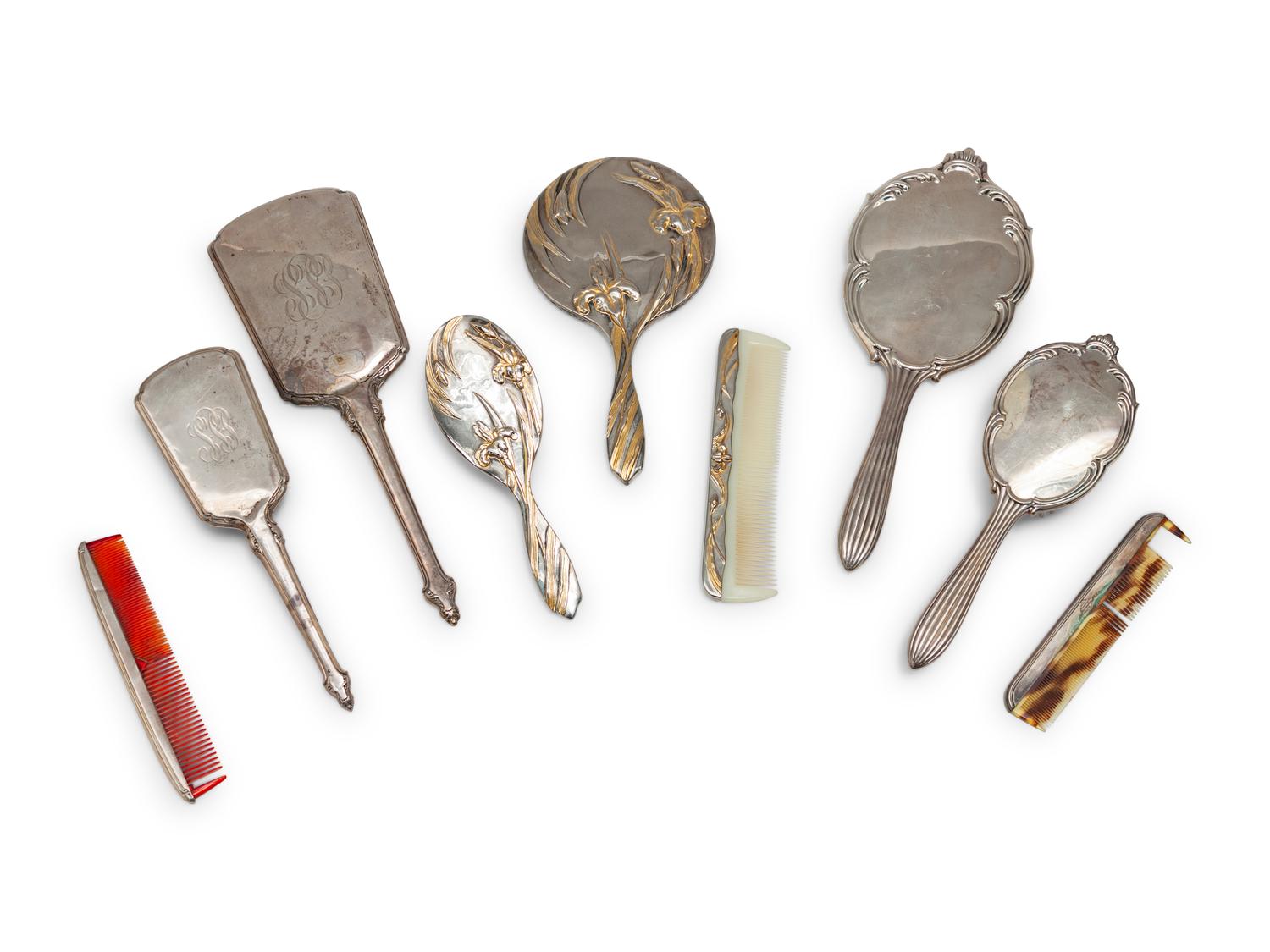 A Group of Art Nouveau Silver Dresser Objects Including Mirrors, Brushes and Combs