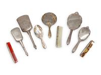 A Group of Art Nouveau Silver Dresser Objects Including Mirrors, Brushes and Combs