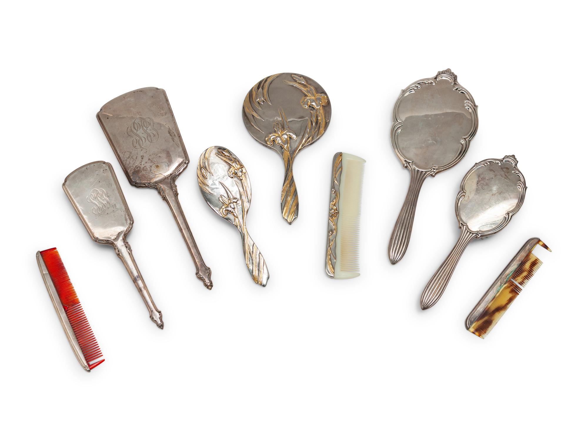 A Group of Art Nouveau Silver Dresser Objects Including Mirrors, Brushes and Combs