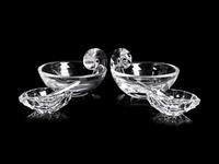 A Pair of Steuben Glass Bowls and a Pair of Steuben Glass Salt Cellars