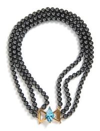 A 14 Karat Yellow Gold, Multi Strand Hematite and Topaz Necklace,