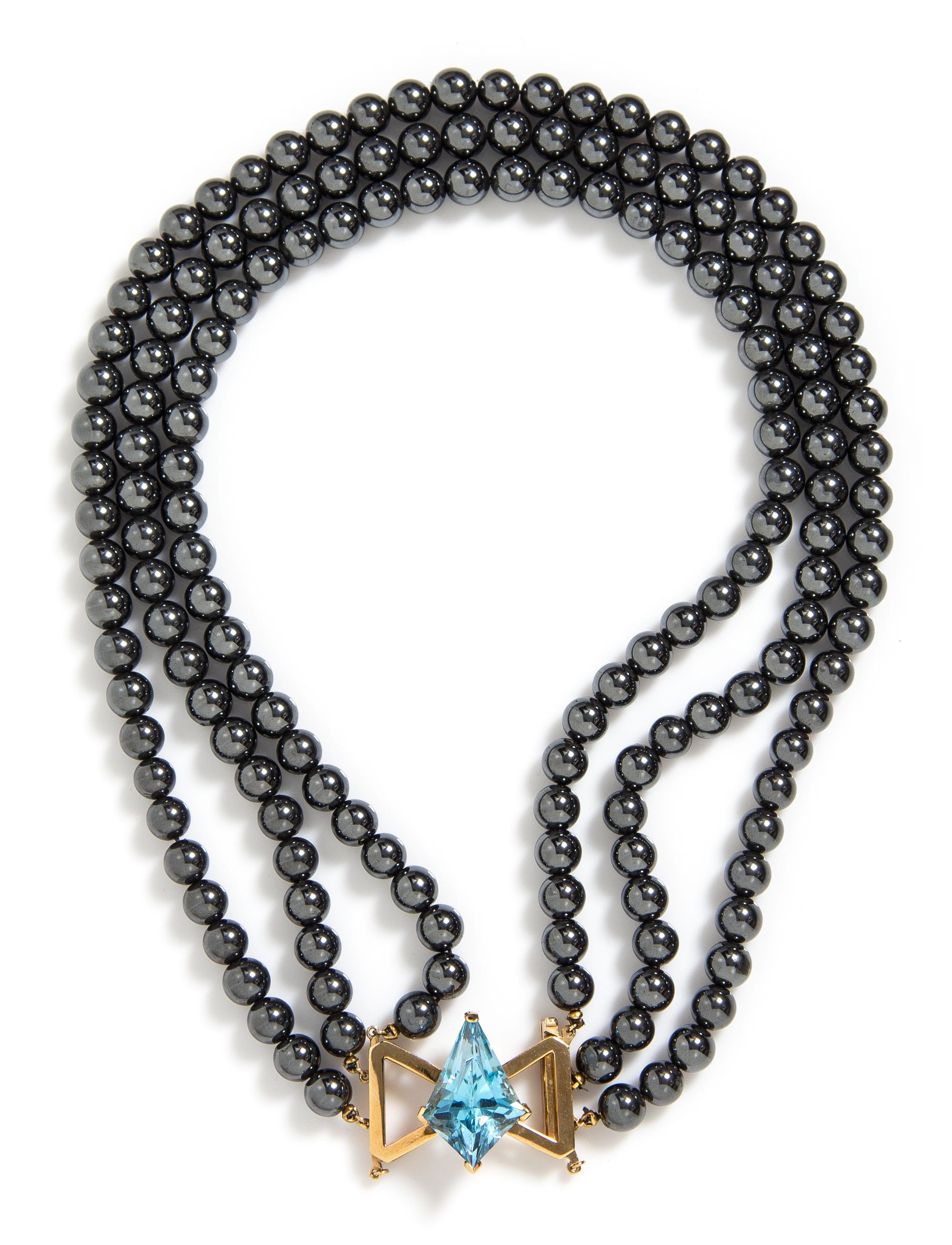 A 14 Karat Yellow Gold, Multi Strand Hematite and Topaz Necklace,