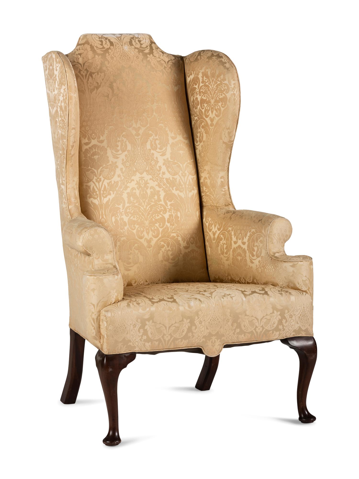 A Queen Anne Style Upholstered Pad Foot Easy Chair