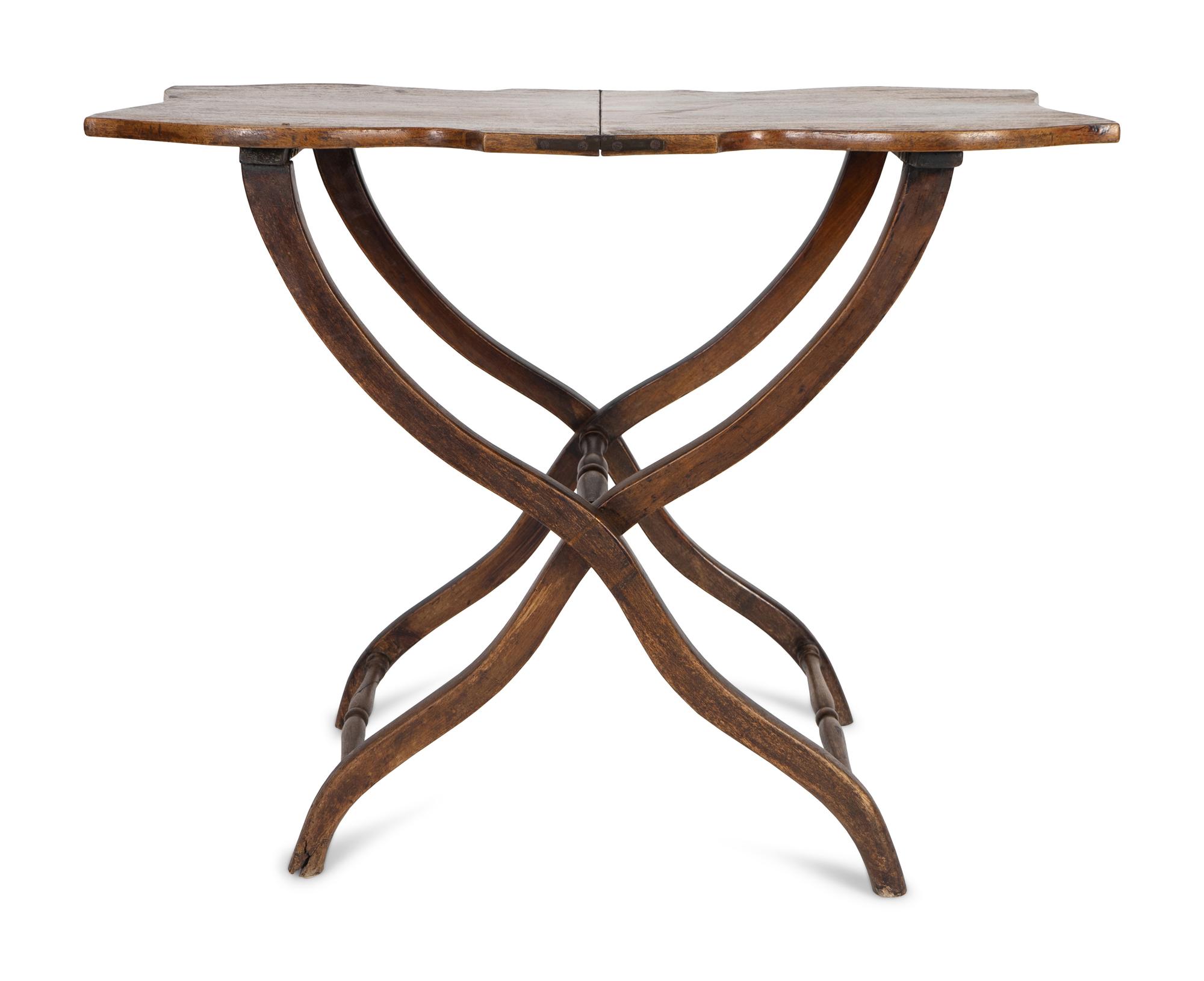 A Victorian Mahogany Folding Butterfly Table on X-form Base — 19TH CENTURY