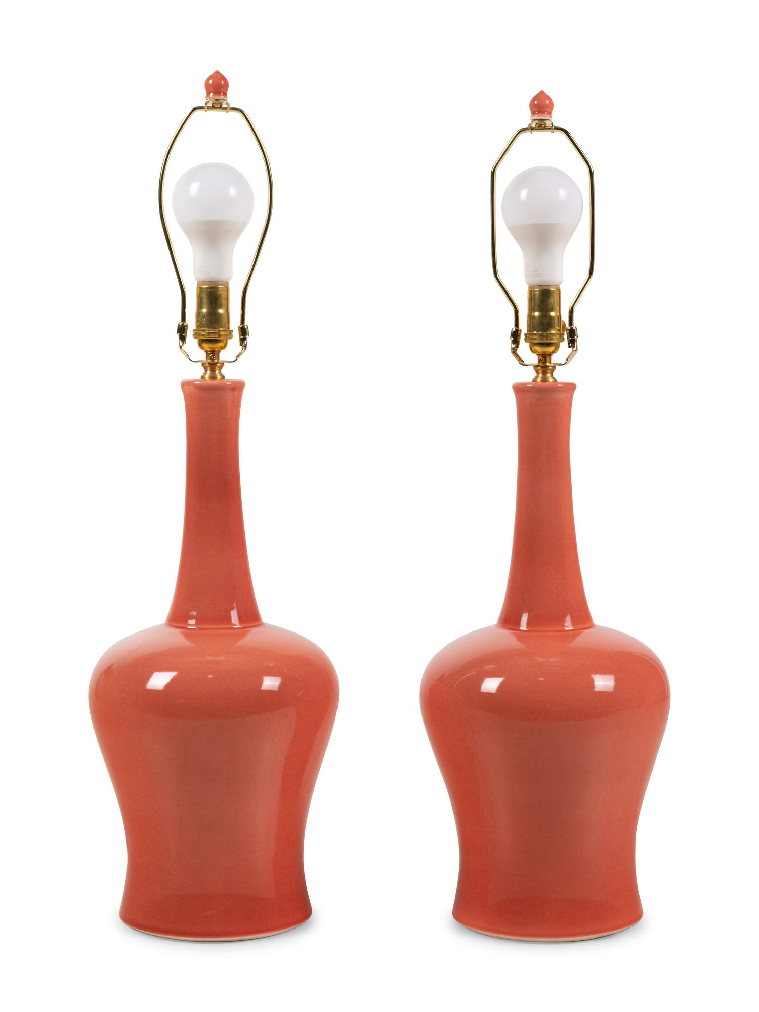 A Pair of Contemporary Peach-Glazed Porcelain Lamps with Shades