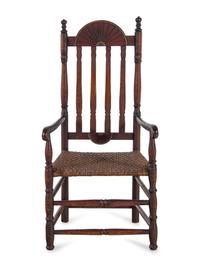 A William and Mary Style Red and Gilt Paint Decorated Bannister Back Woven Splint Seat Armchair