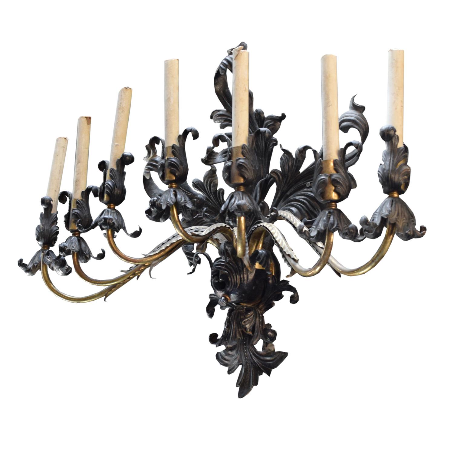 A Brass and Iron Seven Arm Wall Sconce, United States, Circa 1930,