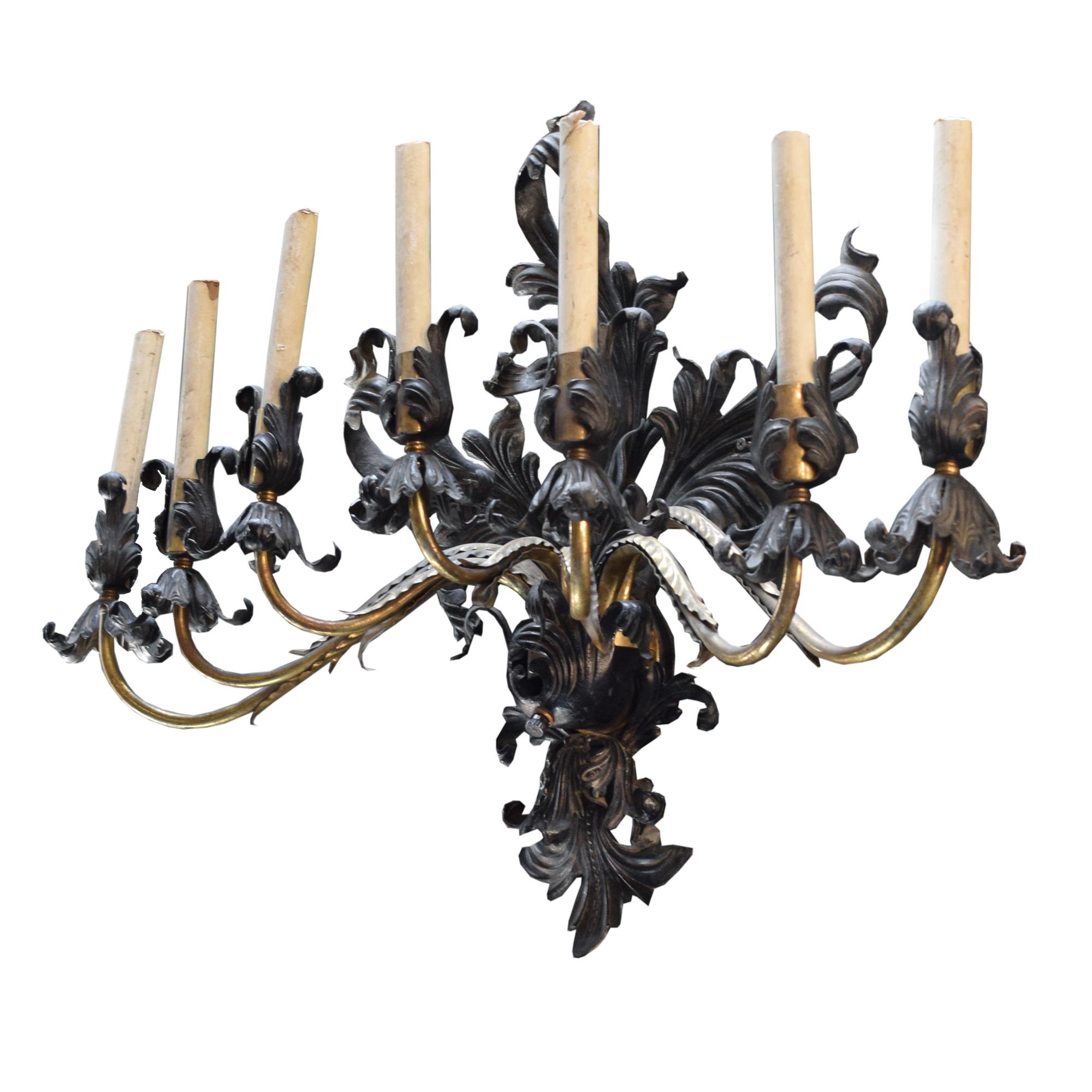 A Brass and Iron Seven Arm Wall Sconce, United States, Circa 1930,
