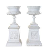 A Pair of Painted Iron Garden Urns