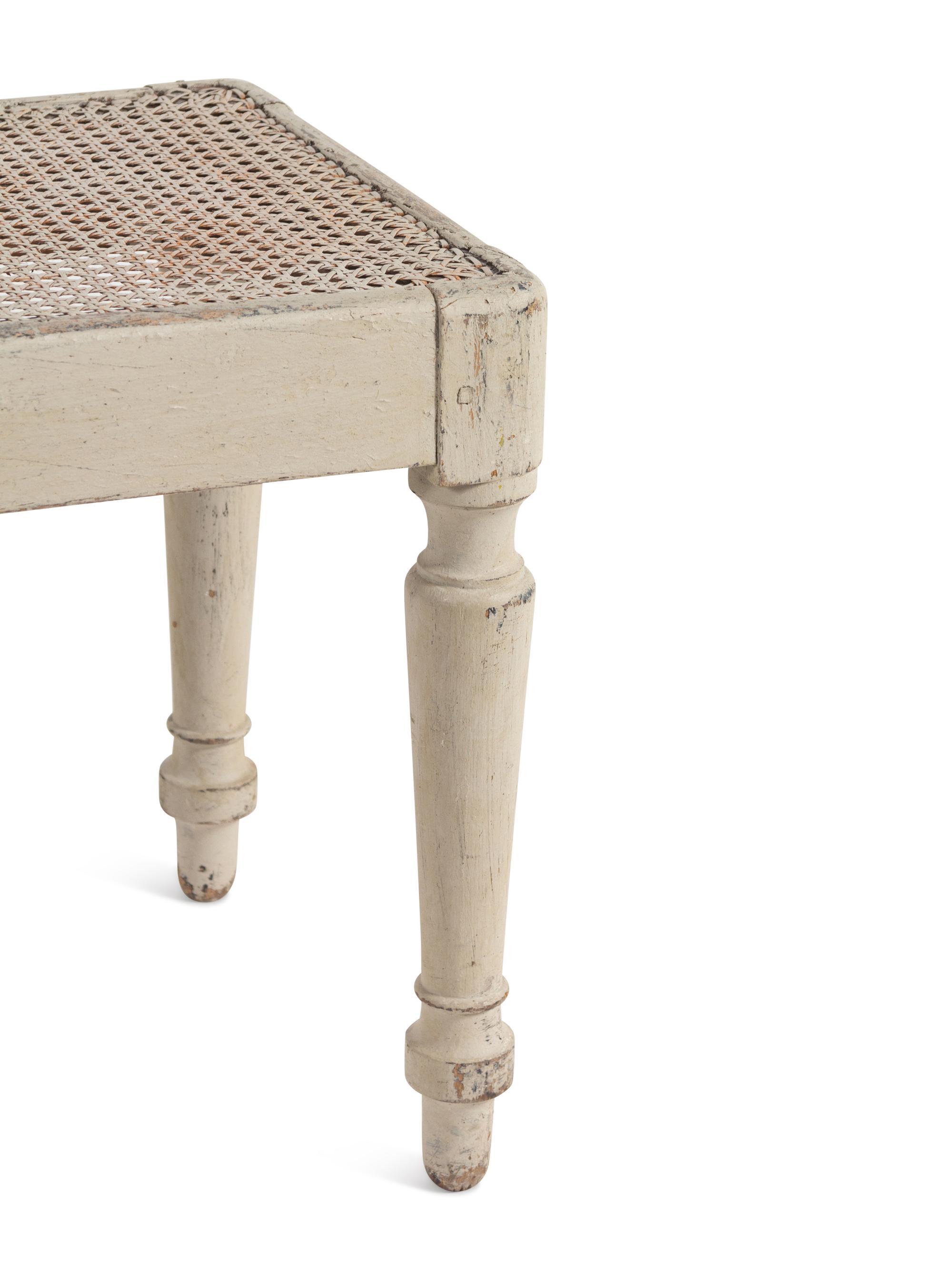 A Gustavian Style Grey-Painted Caned Bench