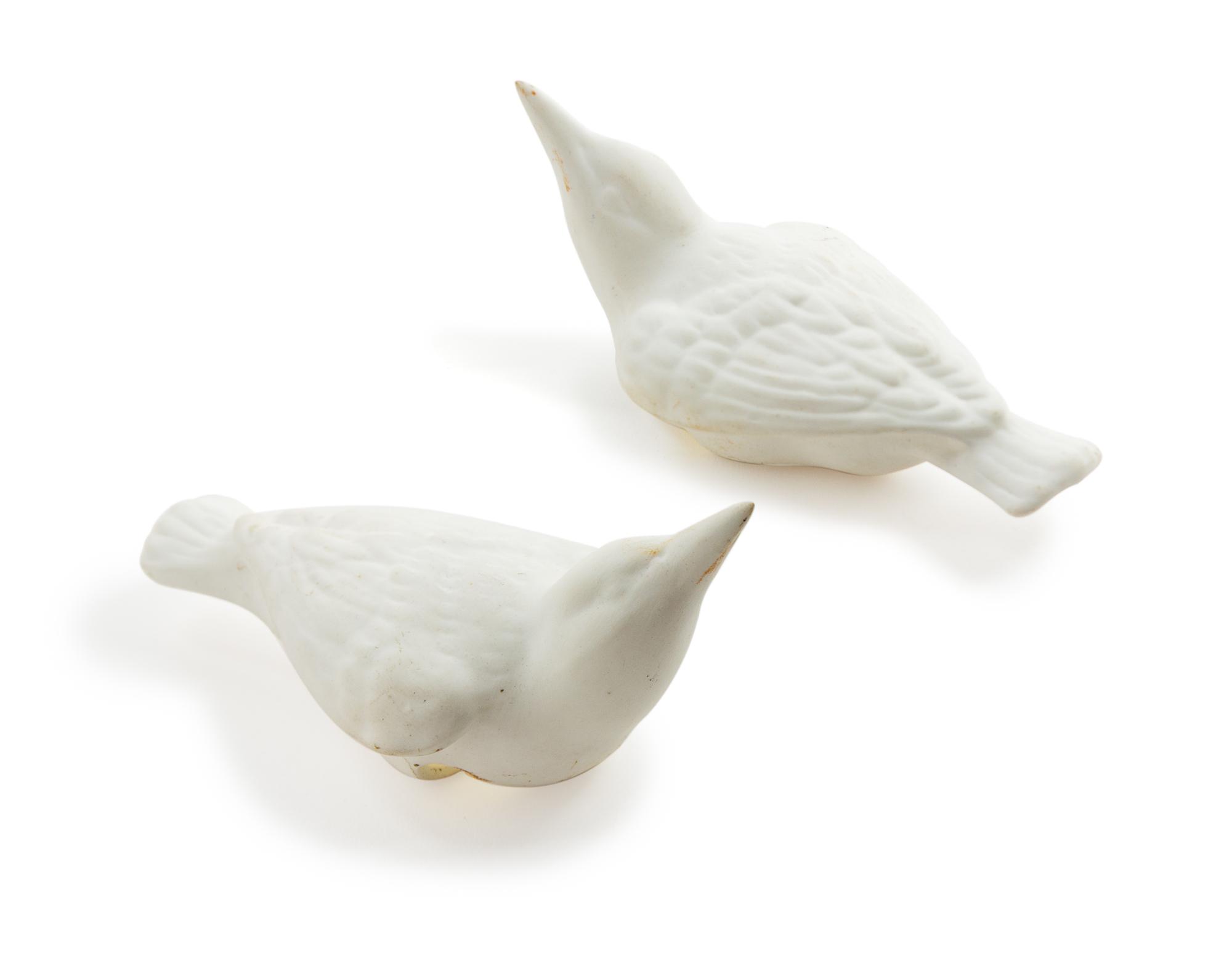 A Pair of White Glazed Porcelain Figures of Birds Length 4 3/8 inches. — 20TH CENTURY