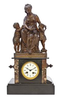 A French Cast Metal and Slate Figural Mantel Clock, Height 22 1/4 inches.