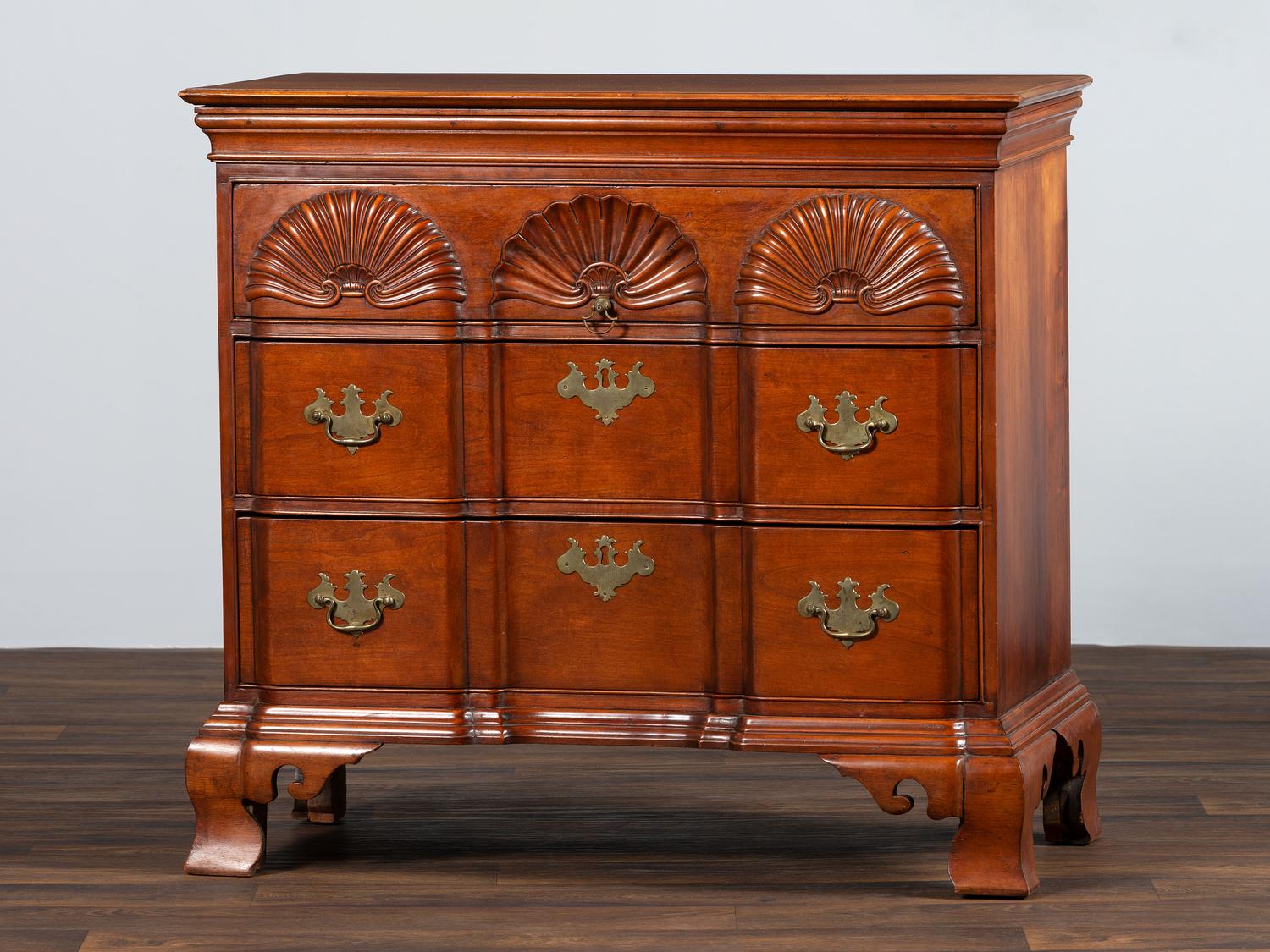 A Chippendale Shell-and-Block Carved Cherrywood Chest of Drawers