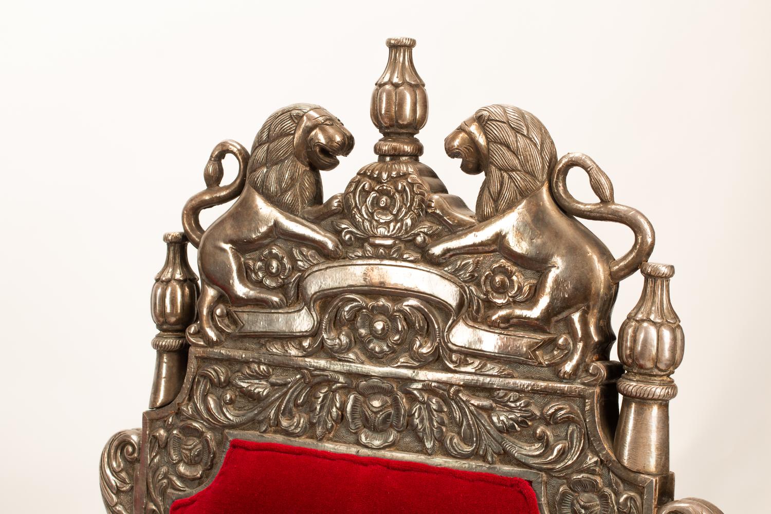 A Pair of Indian Style Silver-Clad Armchairs