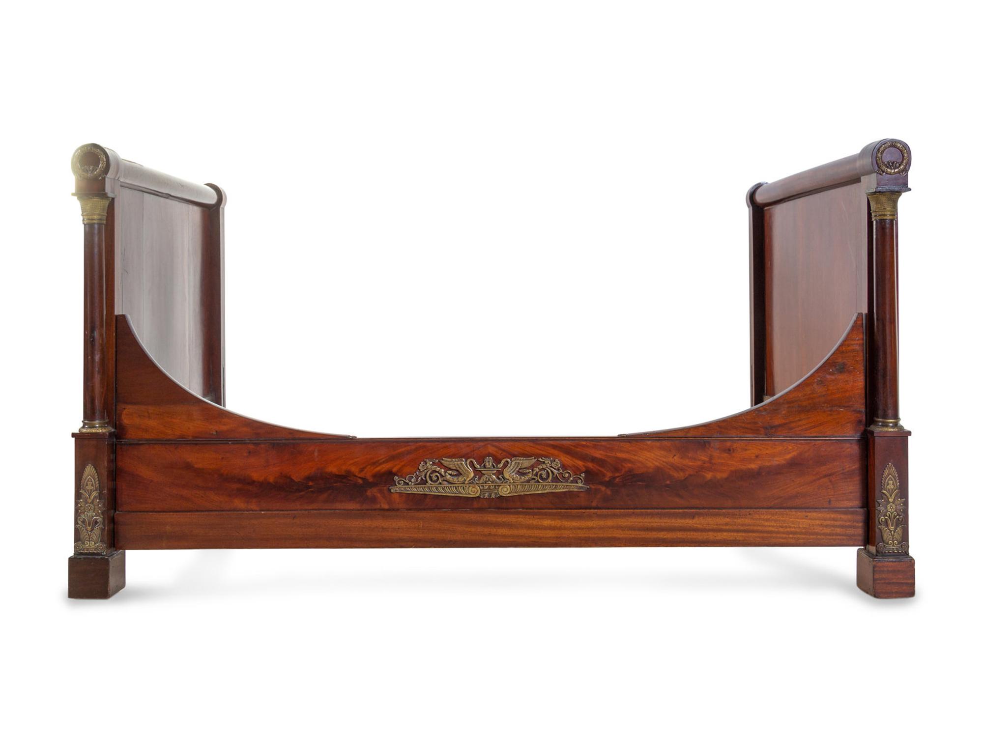 An Empire Style Gilt Metal Mounted Mahogany Bed