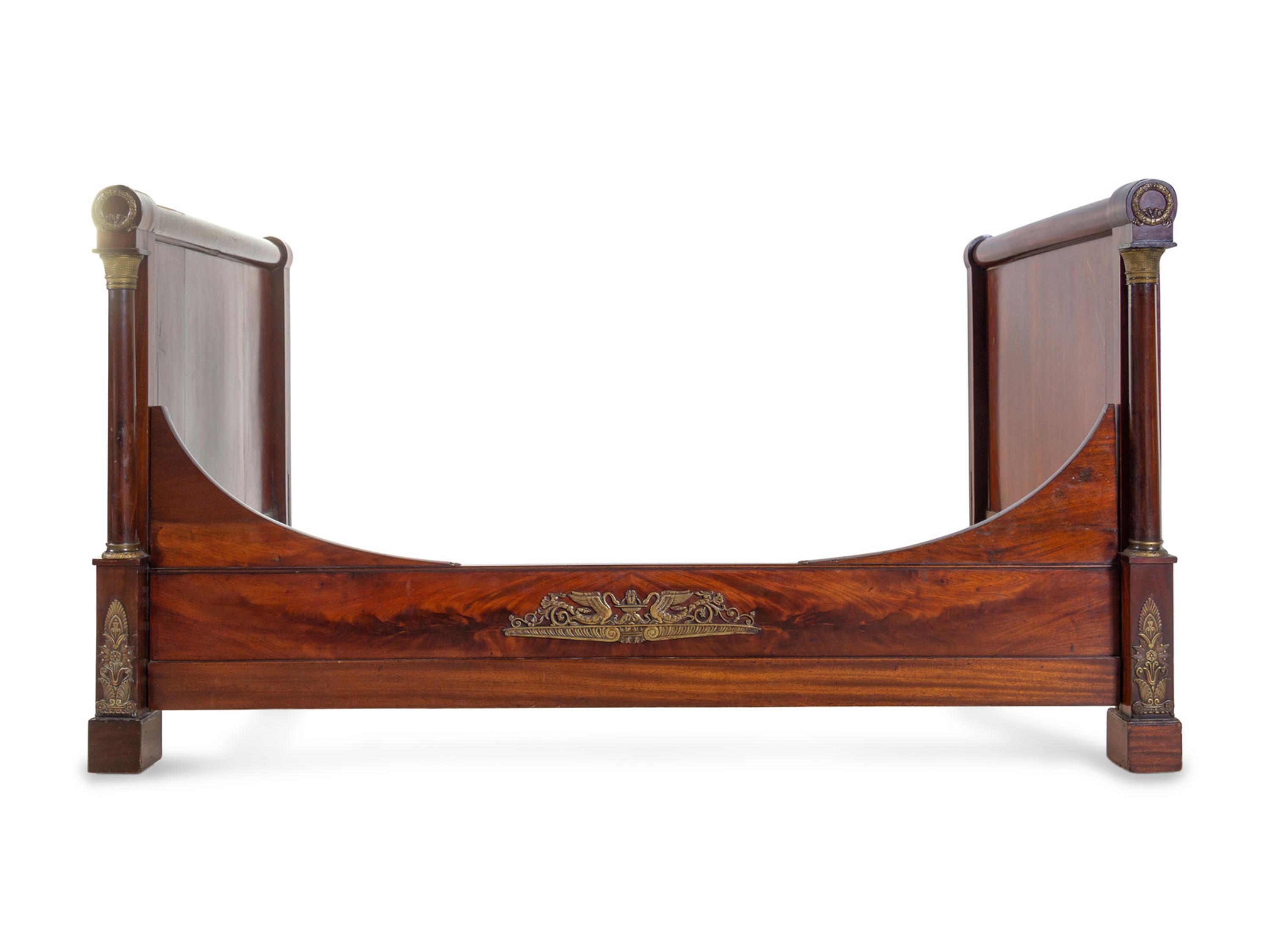 An Empire Style Gilt Metal Mounted Mahogany Bed