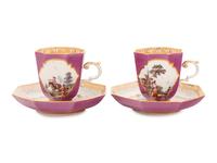 A Pair of Meissen Magenta-Ground Scenic Porcelain Teacups and Saucers
