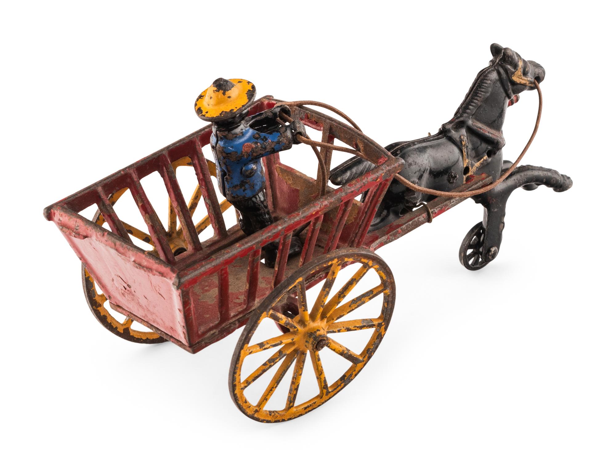 A Group of Three Cast Iron Horse-Drawn Carts