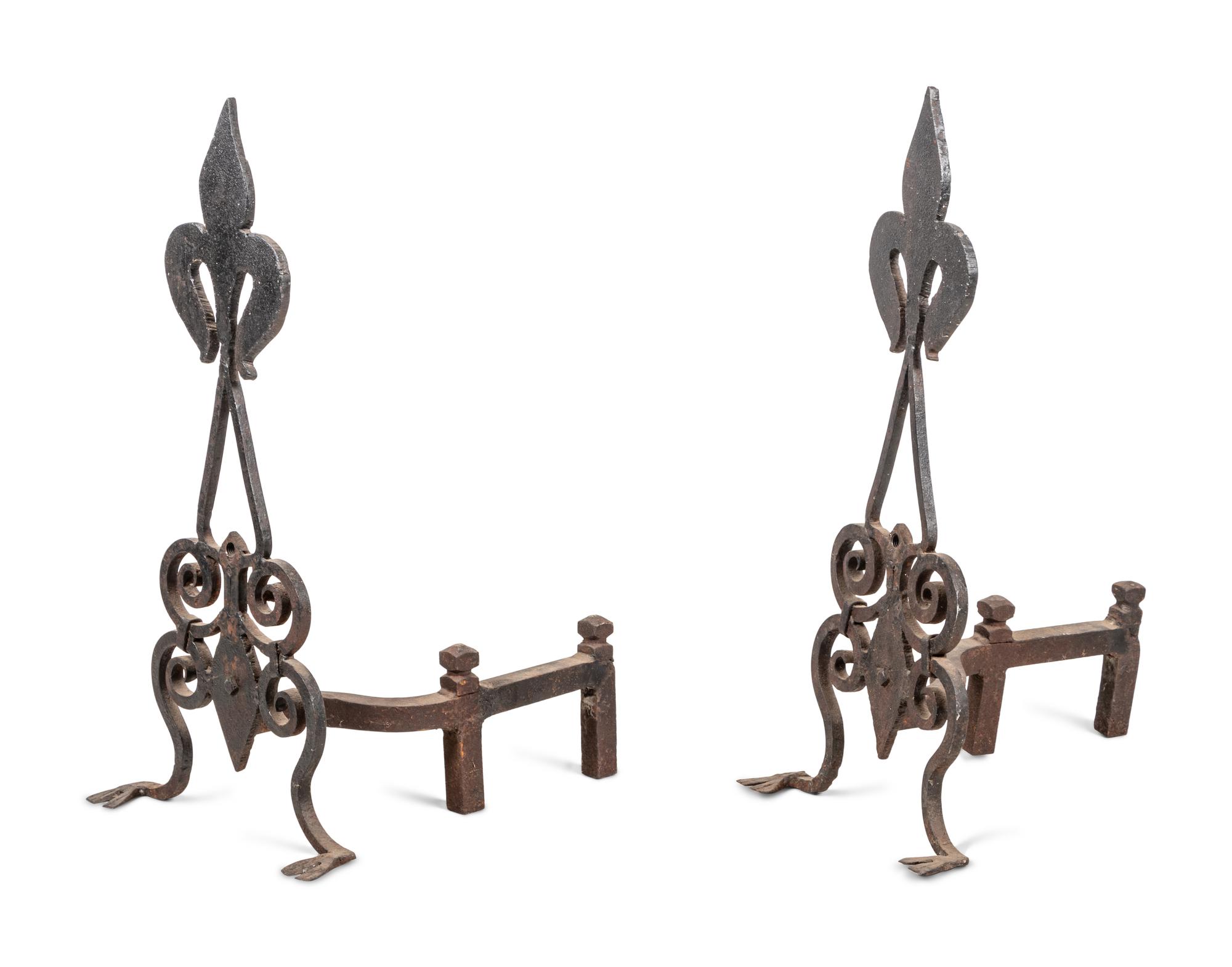 A Pair of Continental Iron Fleur-de-Lis Andirons