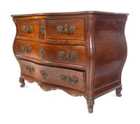 A Louis XV Provincial Walnut Bombé Commode