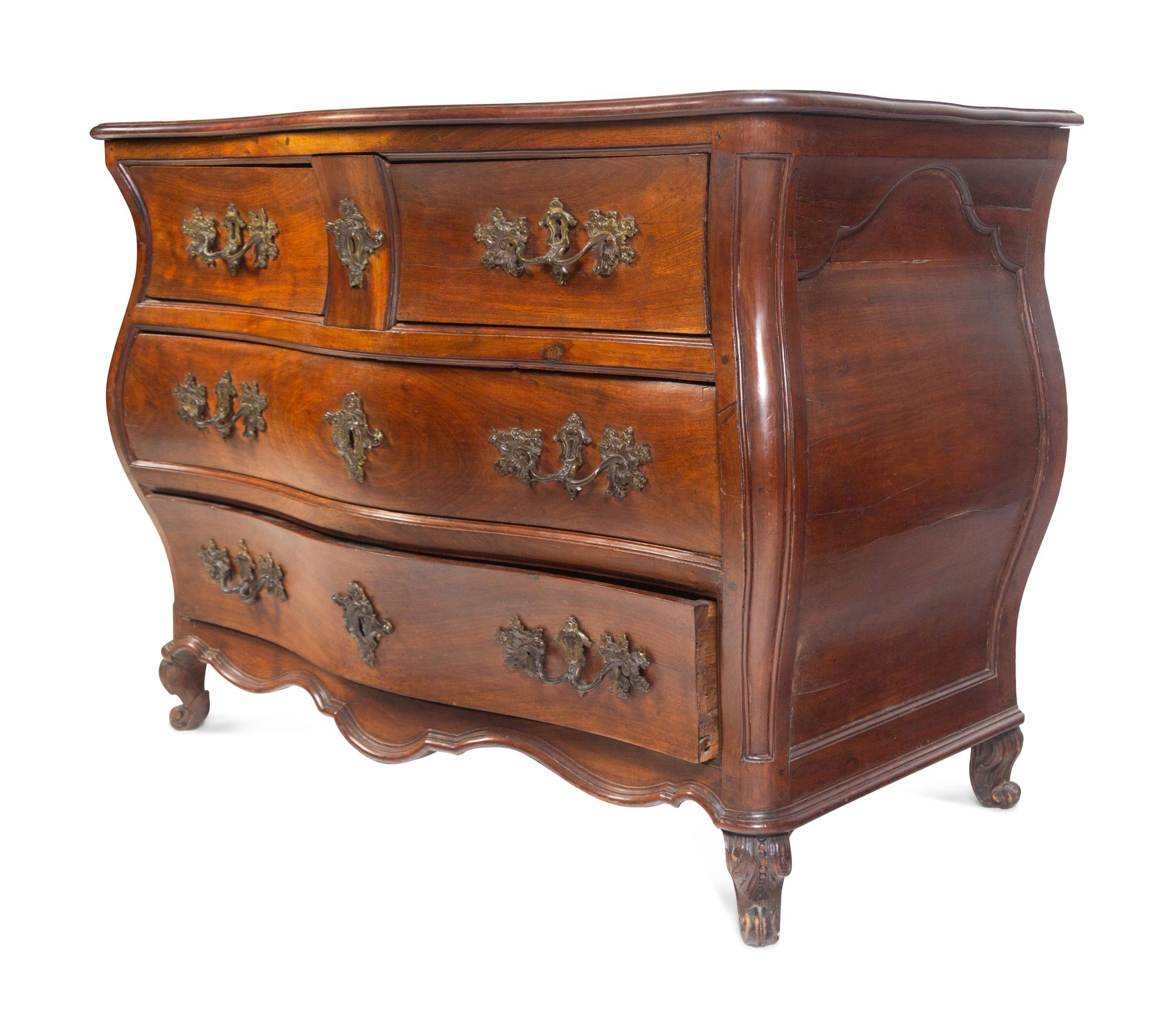 A Louis XV Provincial Walnut Bombé Commode